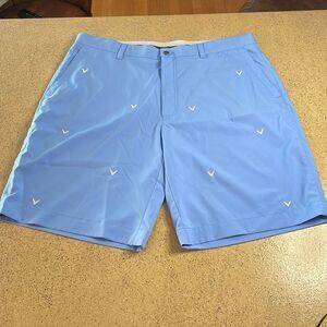Mens Callaway light blue golf shorts with white embroidered logos throughout